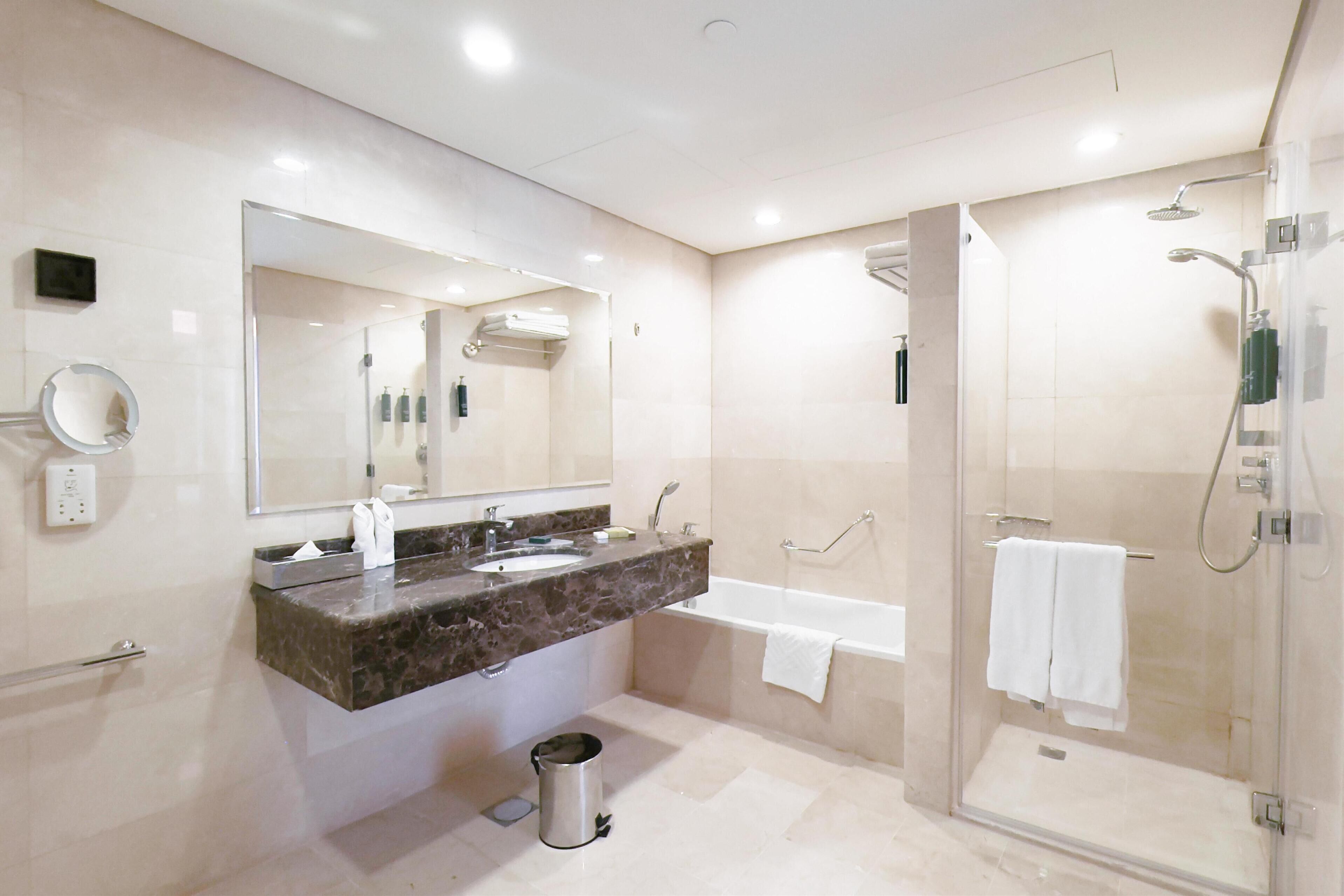 junior suite, 1 king bed (premium) | bathroom | separate bathtub and shower, deep-soaking bathtub, free toiletries