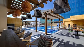 Outdoor pool, pool umbrellas, sun loungers