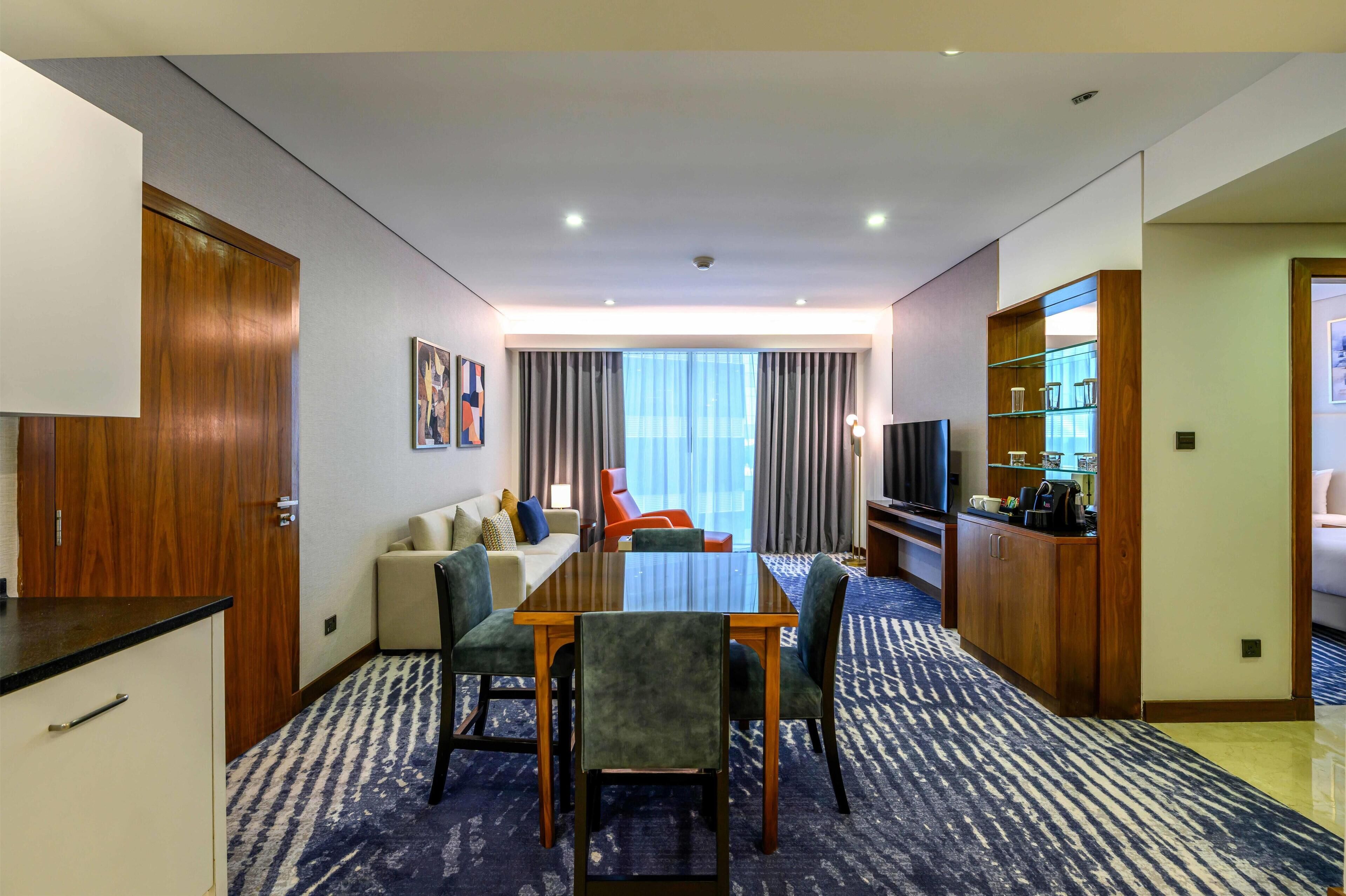 Premium Suite, 3 Bedrooms | Living area | 55-inch flat-screen TV with satellite channels, TV