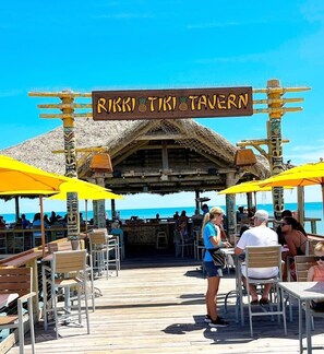 Outdoor dining - The Oceanlena - Luxury beach home, with direct beach access to famous Pier (Cocoa Beach)
