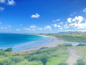On the beach, sun loungers, beach towels