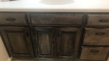 Bathtub, towels, toilet paper