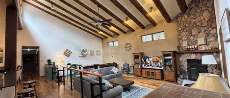 Smart TV, fireplace, foosball, books