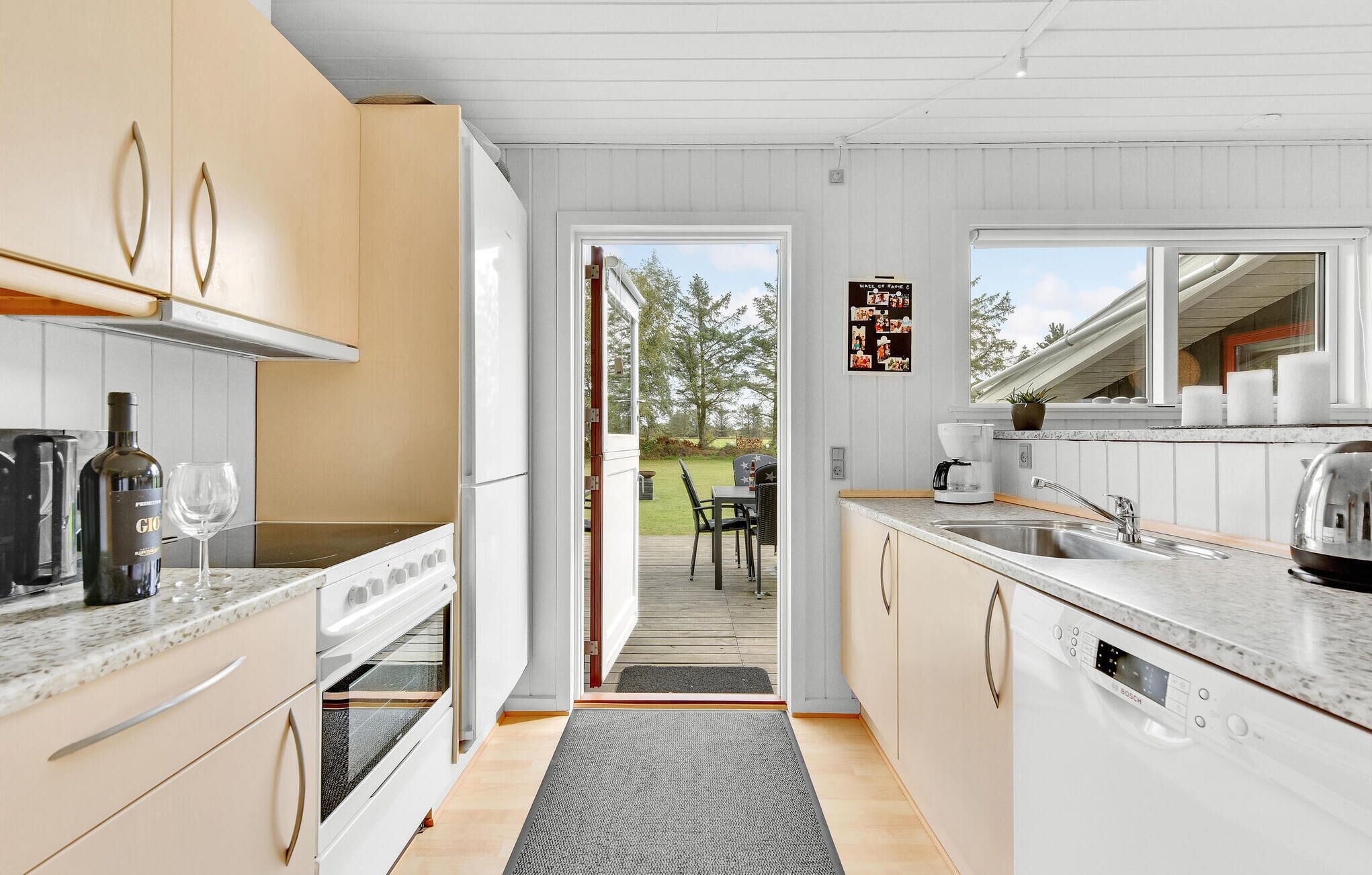 Fridge, stovetop, dishwasher, coffee/tea maker