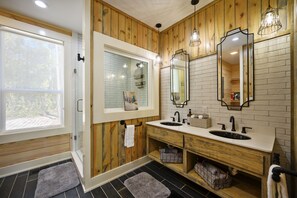 Bathtub, hair dryer, towels, soap