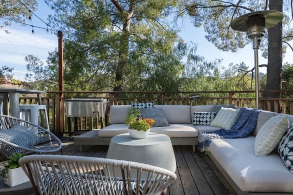 Zen deck offers majestic views and sounds of nature. Perfect gathering spot.