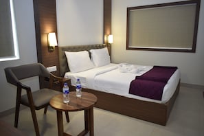 Quarto luxo (AC) | Individualmente mobiliados, Wi-Fi de cortesia, roupa de cama