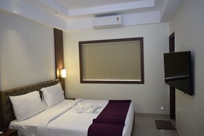 Quarto luxo (AC) | Individualmente mobiliados, Wi-Fi de cortesia, roupa de cama