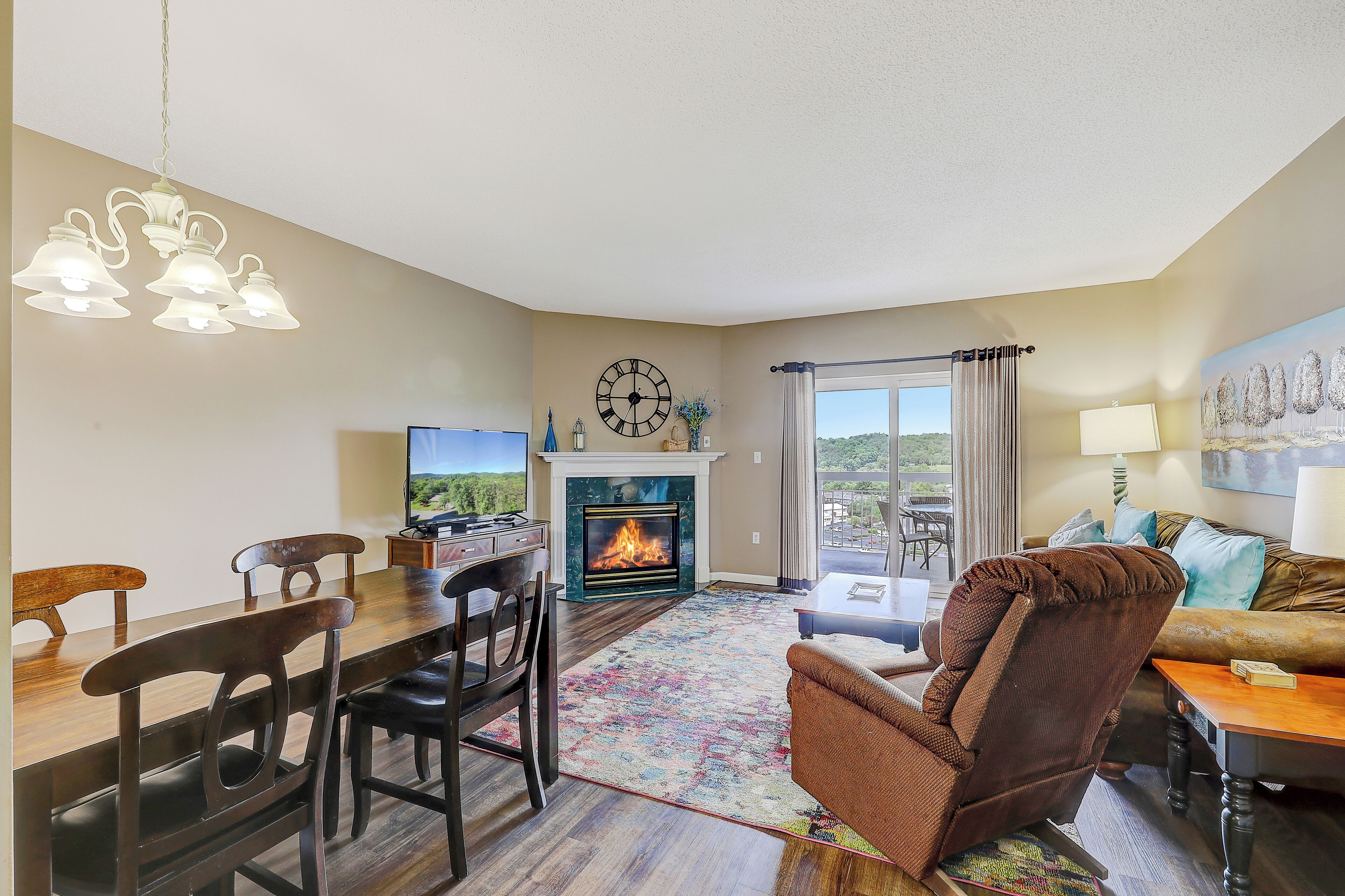 Condo, 1 King Bed with Sofa bed, Balcony (#221 - No Pets) | Living area | 40-inch TV with cable channels, fireplace