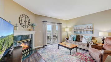 Condo, 1 King Bed with Sofa bed, Balcony (#221 - No Pets) | Living area | 40-inch TV with cable channels, fireplace