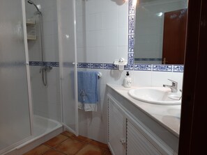 Shower, bidet, towels, soap