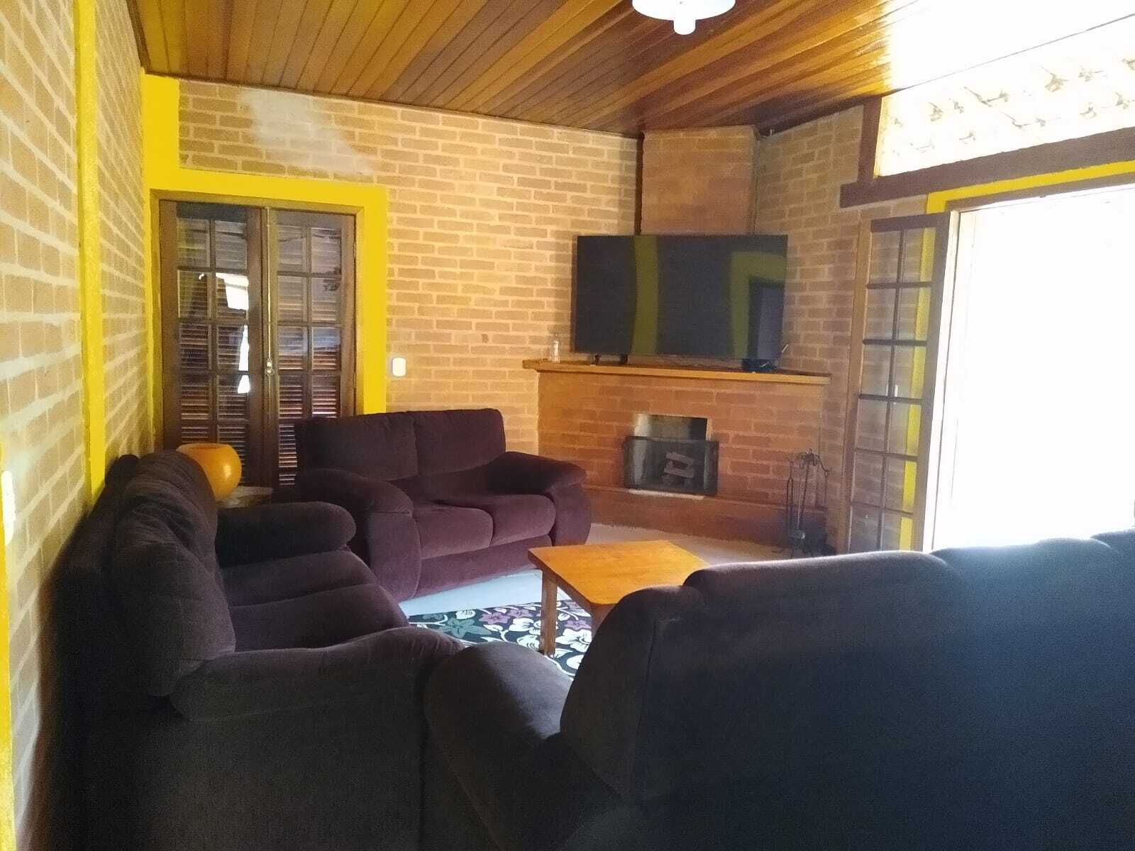 Standard House | Living area | TV, fireplace