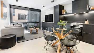 Two Bedroom Apartment | Private kitchen | Full-sized fridge, microwave, oven, stovetop