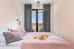 Apartment, 1 Bedroom, Balcony, Beachside | 1 bedroom, bed sheets