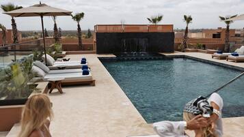 Outdoor pool, sun loungers