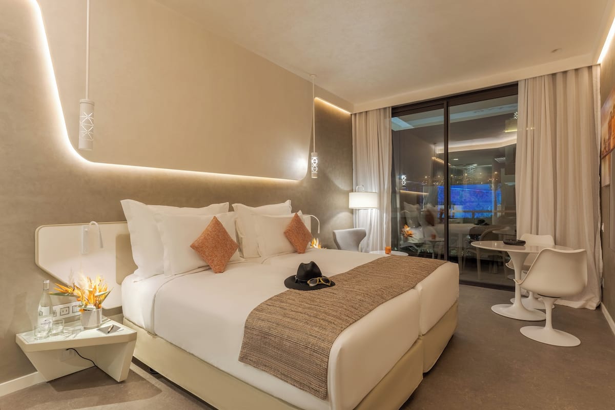 superior double room, city view (cr7 superior avenue) | 1 bedroom, minibar, individually decorated, desk