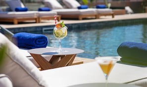 Outdoor pool, sun loungers
