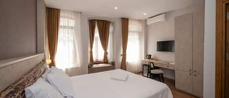 Ropa de cama de alta calidad y minibar