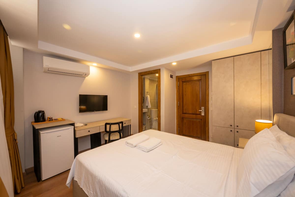 Ropa de cama de alta calidad y minibar