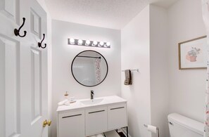Combined shower/bathtub, hair dryer, towels, soap
