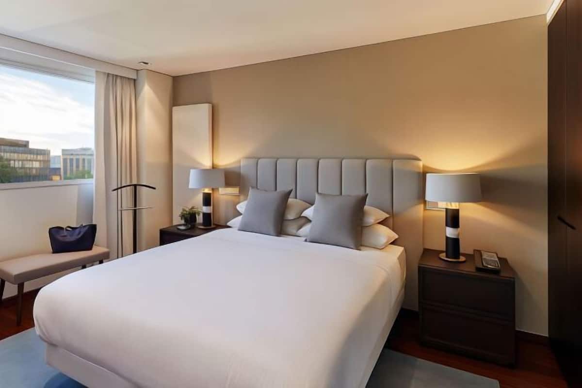 Egyptian cotton sheets, premium bedding, down duvets, memory-foam beds
