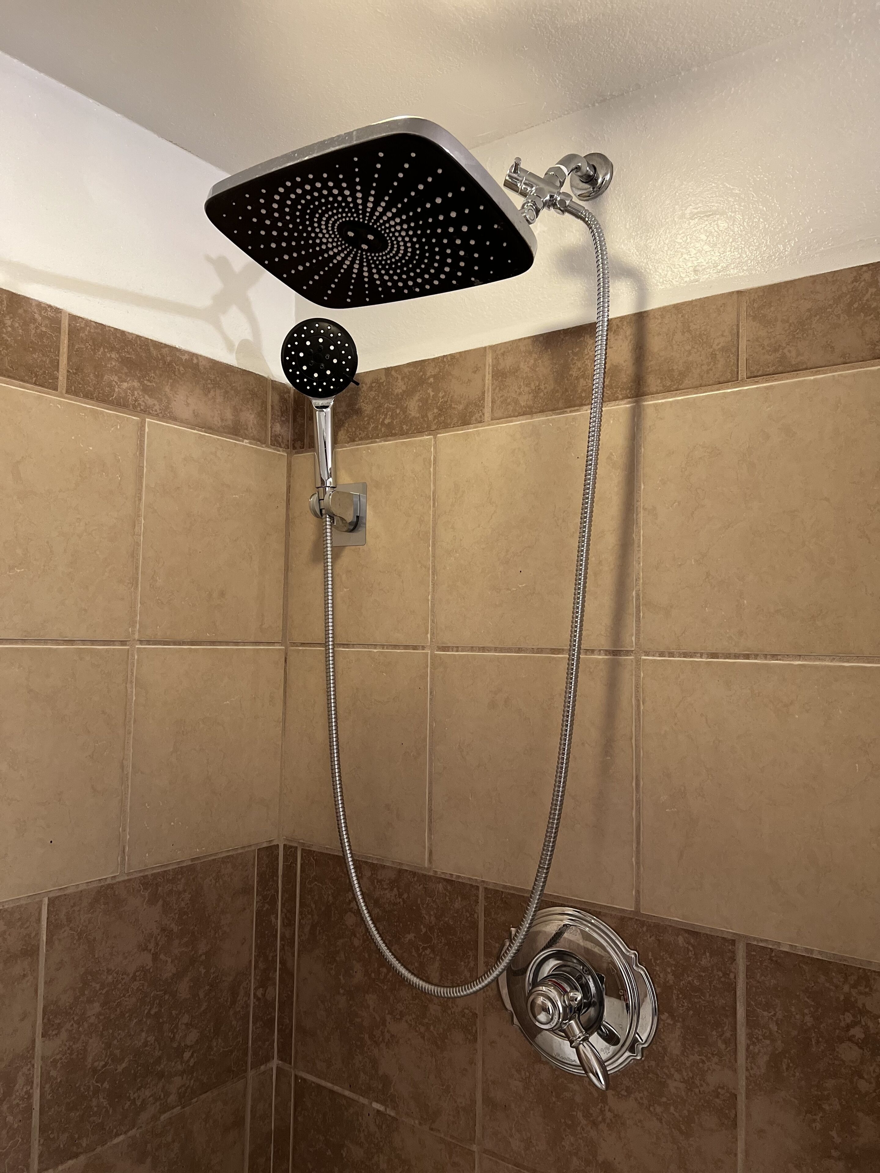Combined shower/tub, hair dryer, towels, soap