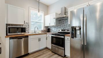 House (614 & 616 S. Converse St. Full Duplex) | Private kitchen | Fridge, microwave, stovetop, dishwasher