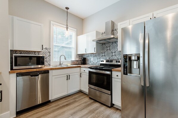 House (614 & 616 S. Converse St. Full Duplex) | Private kitchen | Fridge, microwave, stovetop, dishwasher