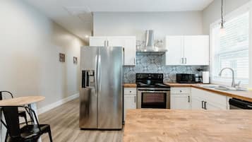 House (614 & 616 S. Converse St. Full Duplex) | Private kitchen | Fridge, microwave, stovetop, dishwasher