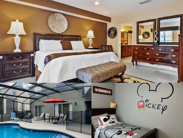 Habitación de hotel con una cama grande, un banco para sentarse, un baño con espejo y tocador, y una zona de piscina con sillones de descanso.