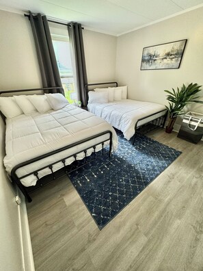 2 bedrooms, desk, iron/ironing board, travel cot