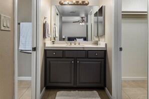 Combined shower/bathtub, hair dryer, towels, soap