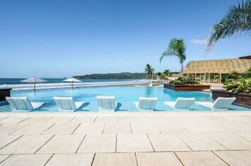 sit in the infinity pool and soak up the view and sun