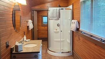 Combined shower/tub, towels, soap, toilet paper