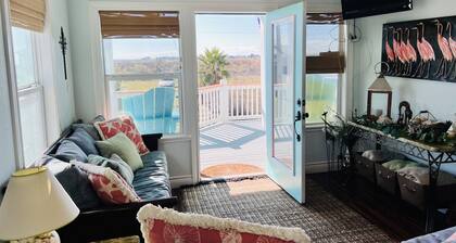 Home with beach view from porch and it’s only a two minute walk to the beach.