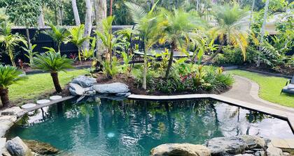 Villa Coral • Tropical Beachside Oasis with Private Garden & Heated Pool