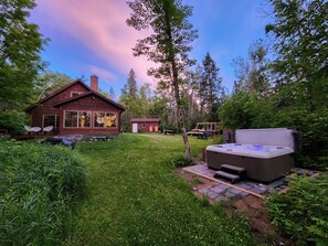 Wildwood Escapes-Chippewa River Cabin is located 40 SE of Hayward, WI. - Secluded Riverfront Cabin | Hot Tub + Starlink (Ojibwa)