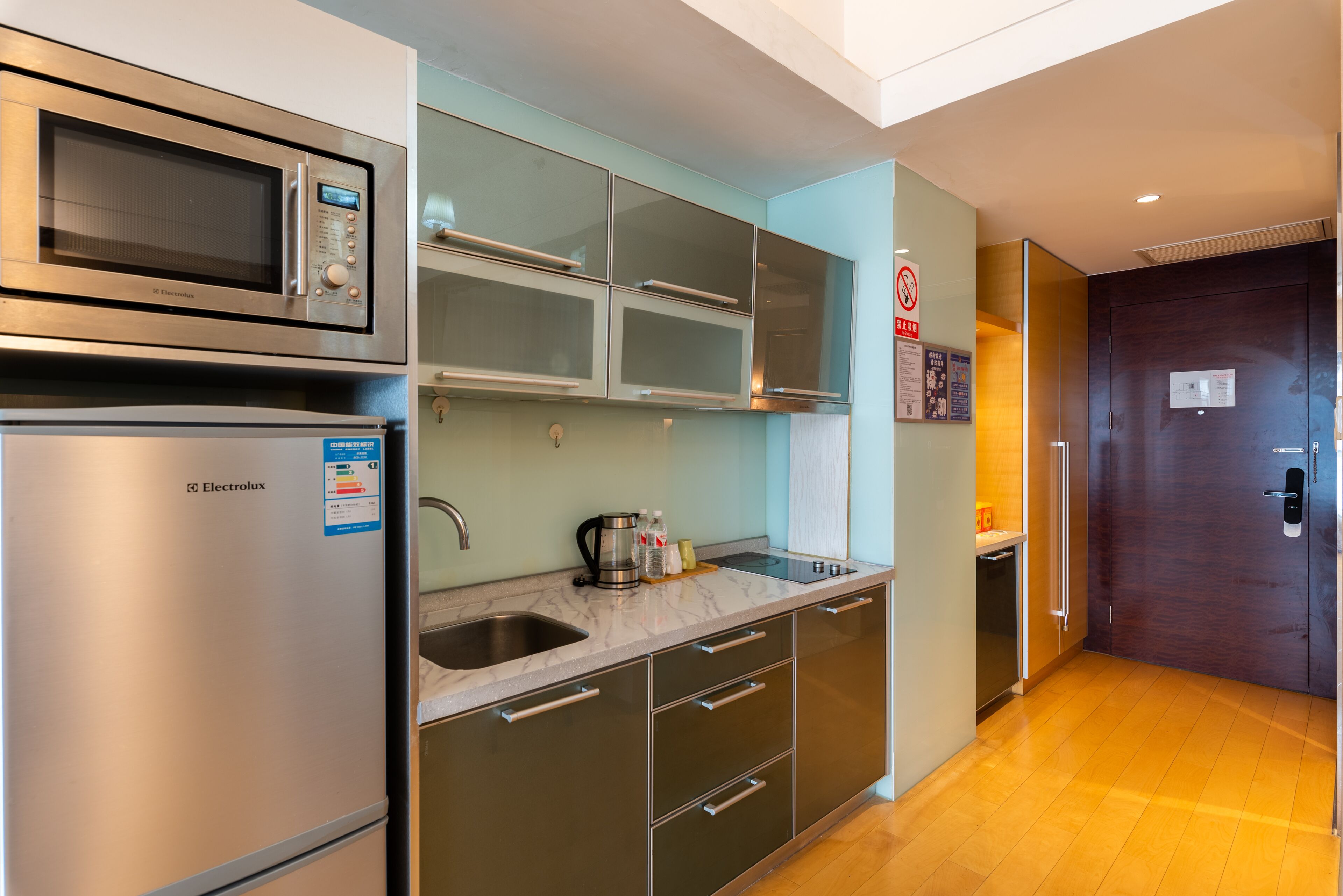 full-sized fridge, microwave, stovetop, rice cooker