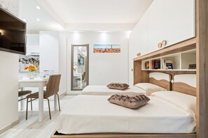 1 chambre, fer et planche à repasser, accès à Internet