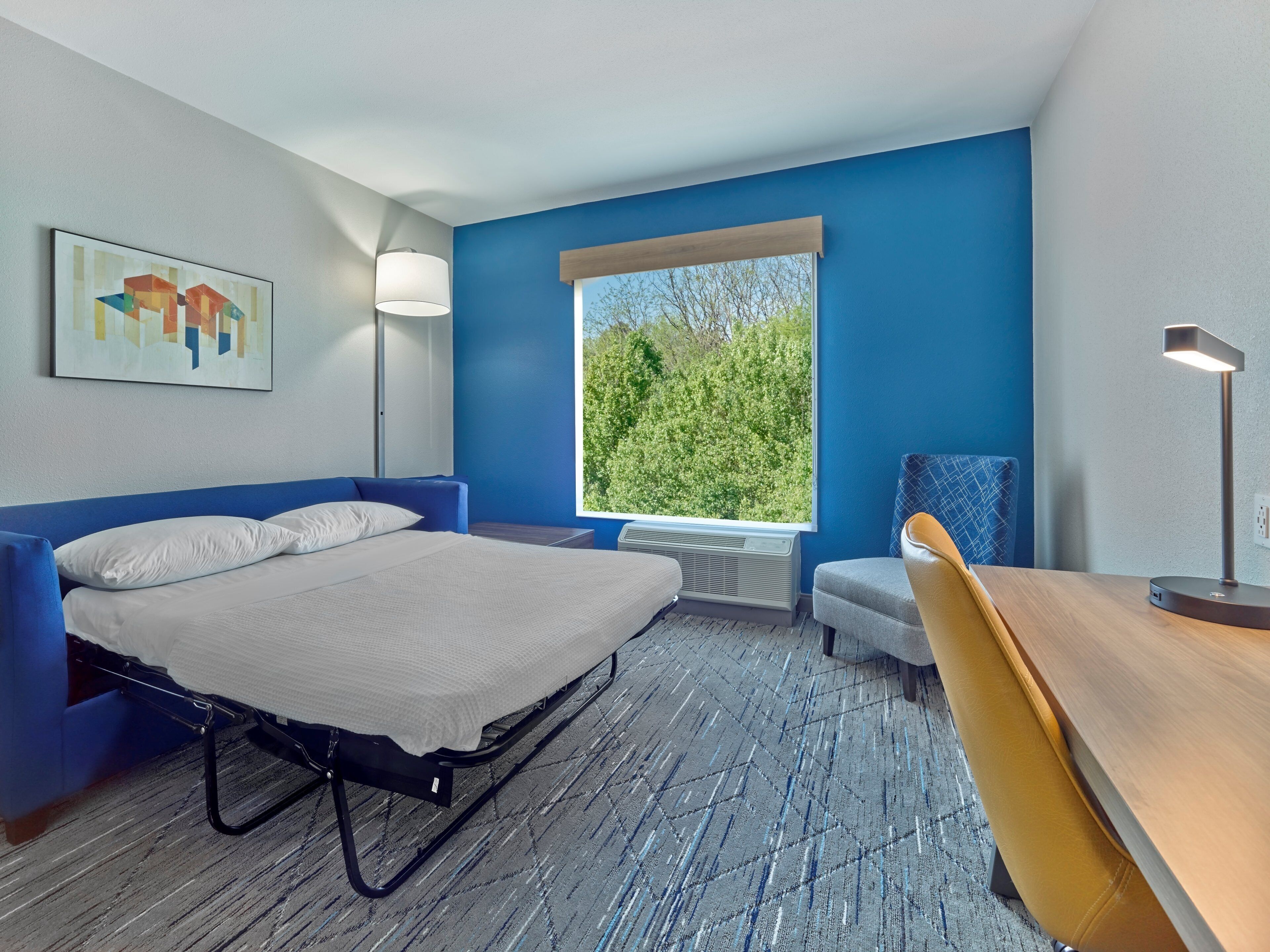 Hypo-allergenic bedding, in-room safe, desk, laptop workspace