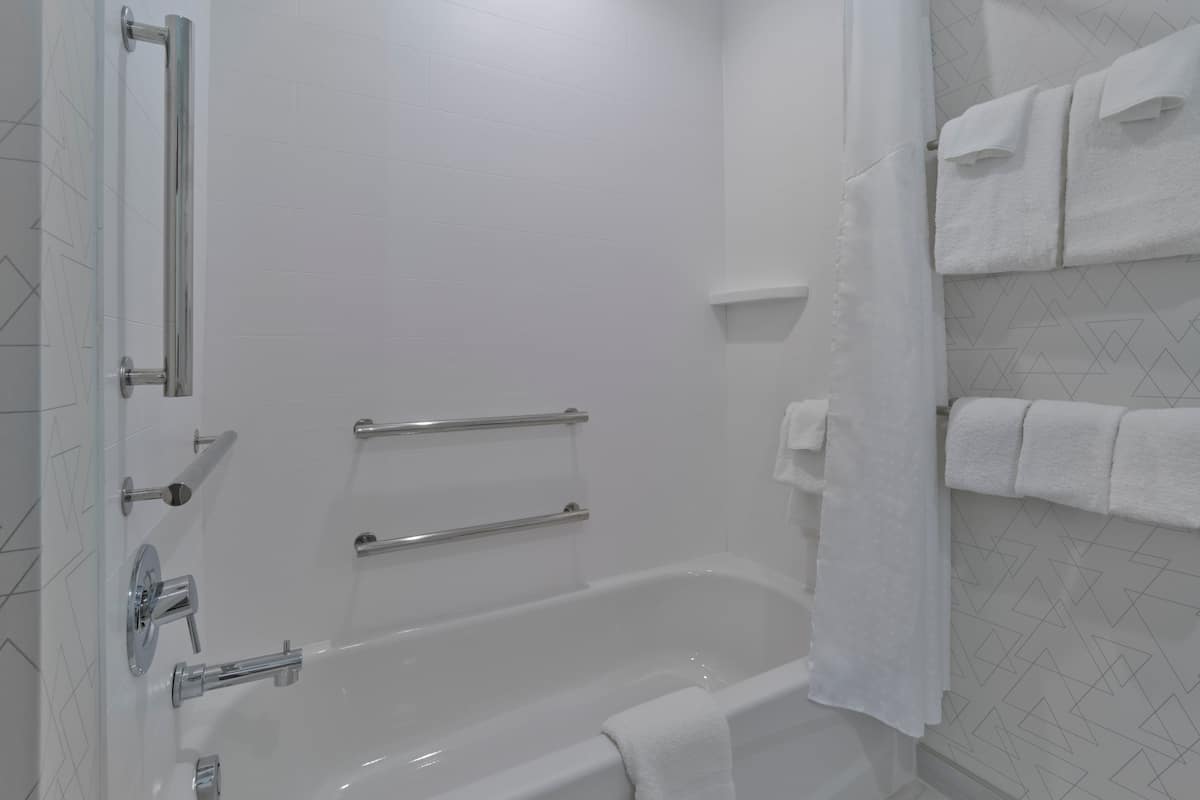 Hair dryer, towels, soap, shampoo