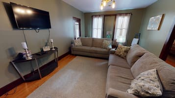 Smart TV, fireplace, DVD player, books