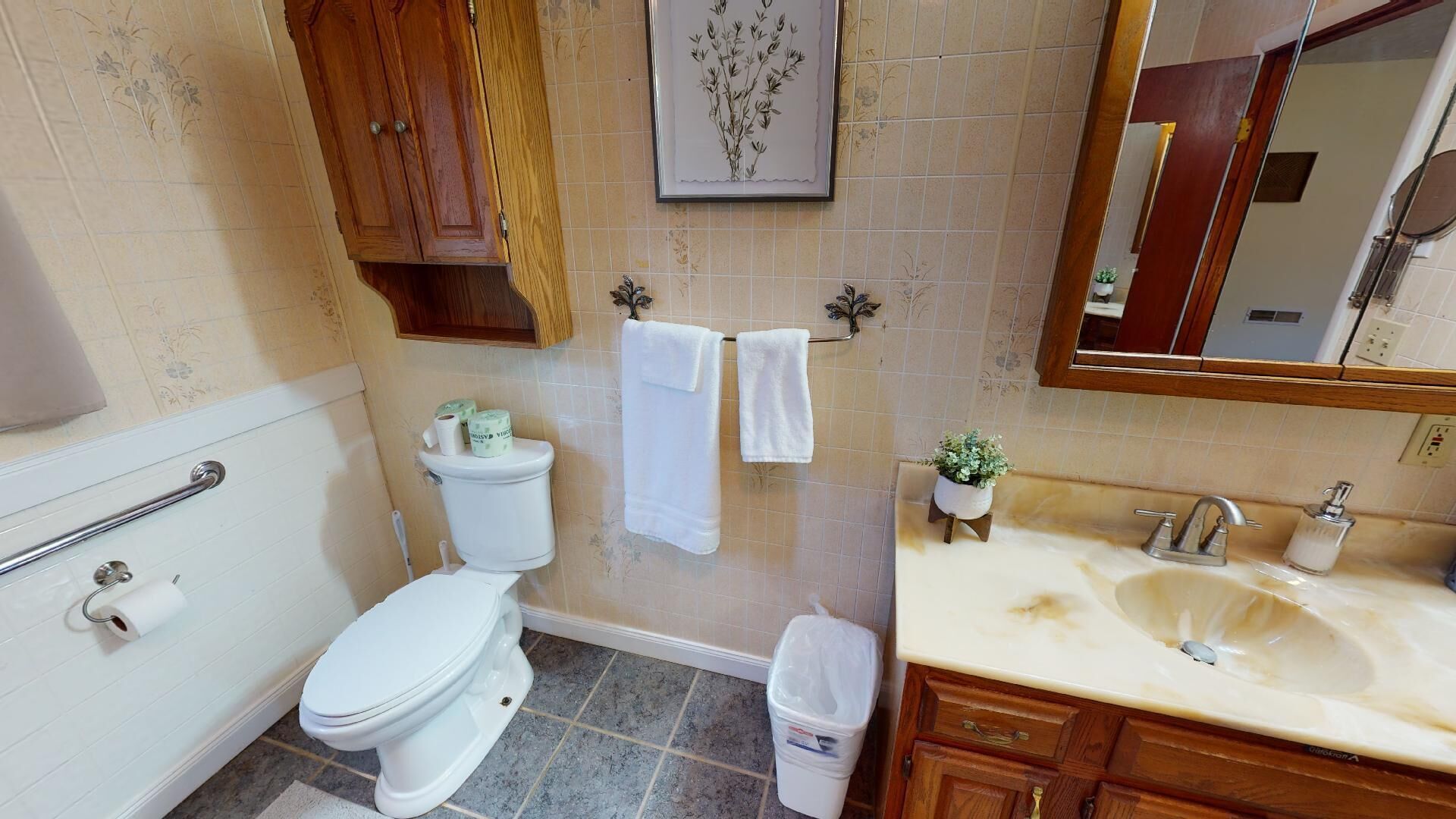 Bathtub, towels, soap, toilet paper