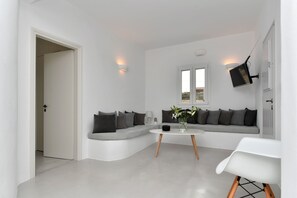 Relax in comfort with ample seating and entertainment options.