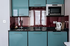Fridge, microwave, stovetop, electric kettle
