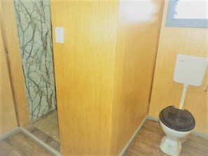 Apartment | Bathroom | Combined shower/tub, deep soaking tub, hair dryer, towels