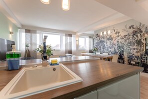 Appartement, salle de bains privée | Cuisine partagée