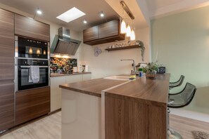 Appartement, salle de bains privée | Cuisine partagée