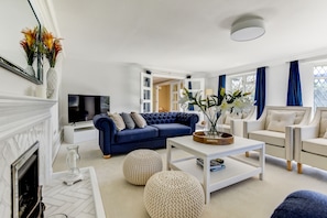 Smart TV, fireplace, table tennis, books