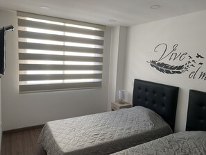 2 dormitorios, escritorio, tabla de planchar con plancha y wifi gratis